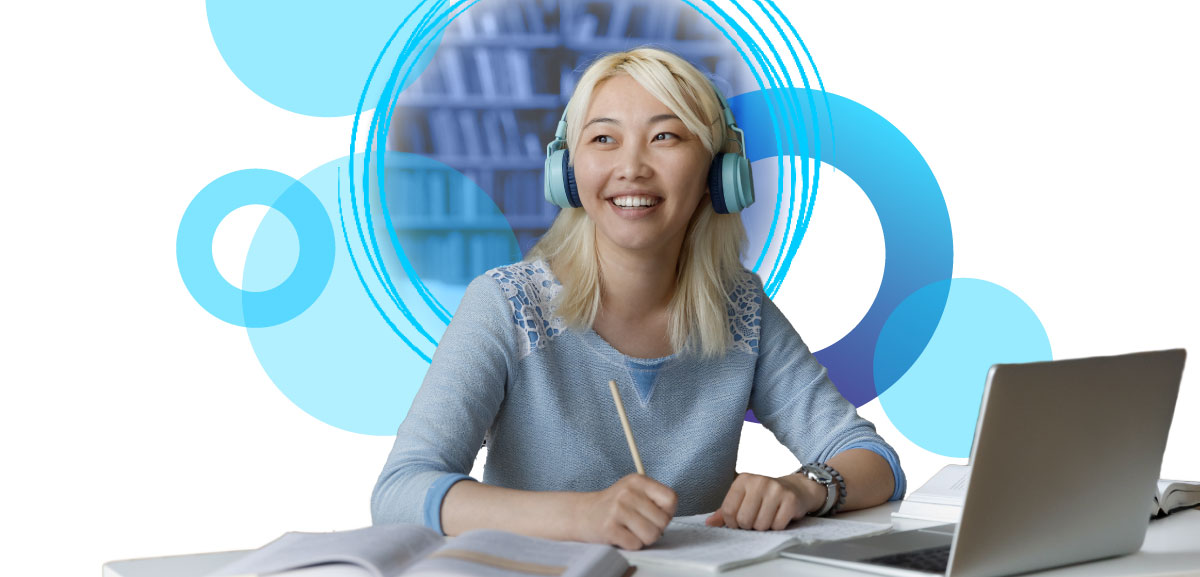 A person with light-blonde hair smiles while wearing blue over-ear headphones and writing in a notebook. They are sitting at a white desk with a laptop and open books. Behind them, a stylized blue graphic features overlapping circles and a faint image of bookshelves in a library.