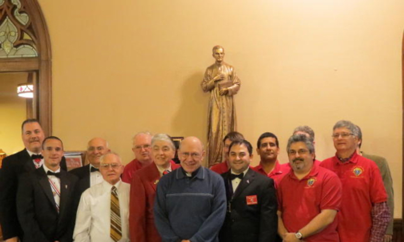 Church members with the statue of Father McGivney at the St. Thomas Church, Thomaston, CT.
