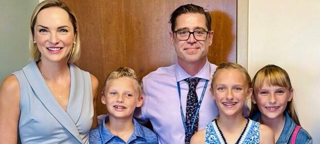 Tatiana with Dr. Sean Dineen and her daughters at Moffitt Cancer Center