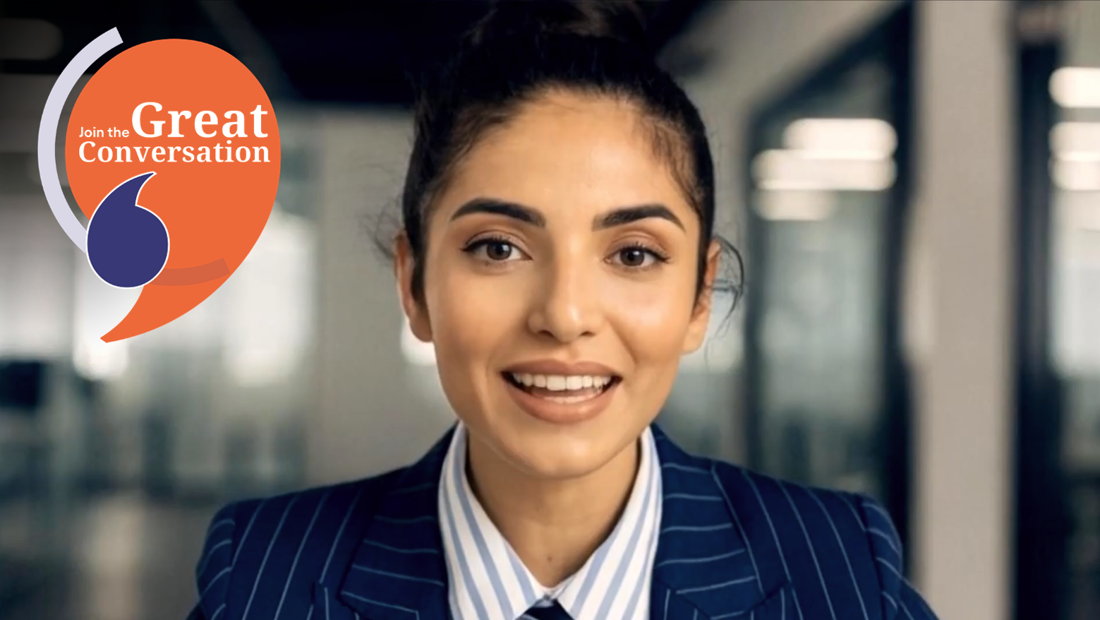 Close up of a smiling young woman in office outfit, on the side a logo says  'Join the Great Conversation'
