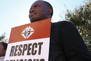 A man participates in a religious freedom rally organized by Knights of Columbus in Austin, Texas, in 2015.