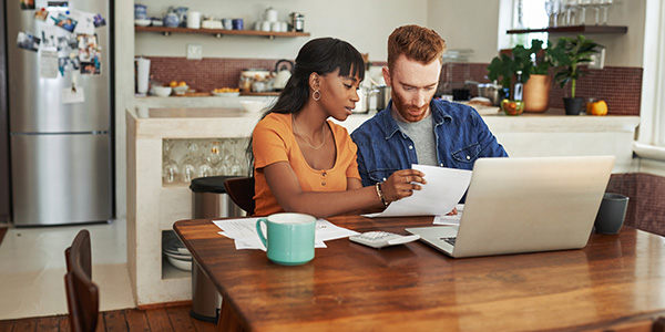 couple reviewing financial documents