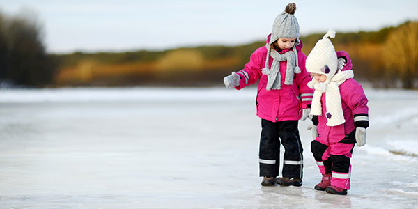 little girls outdoor ice skating