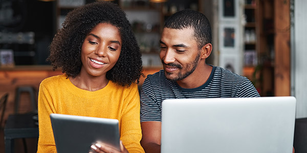 couple looking at a tablet