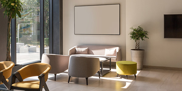 The inside of a living room full of modern furniture 
