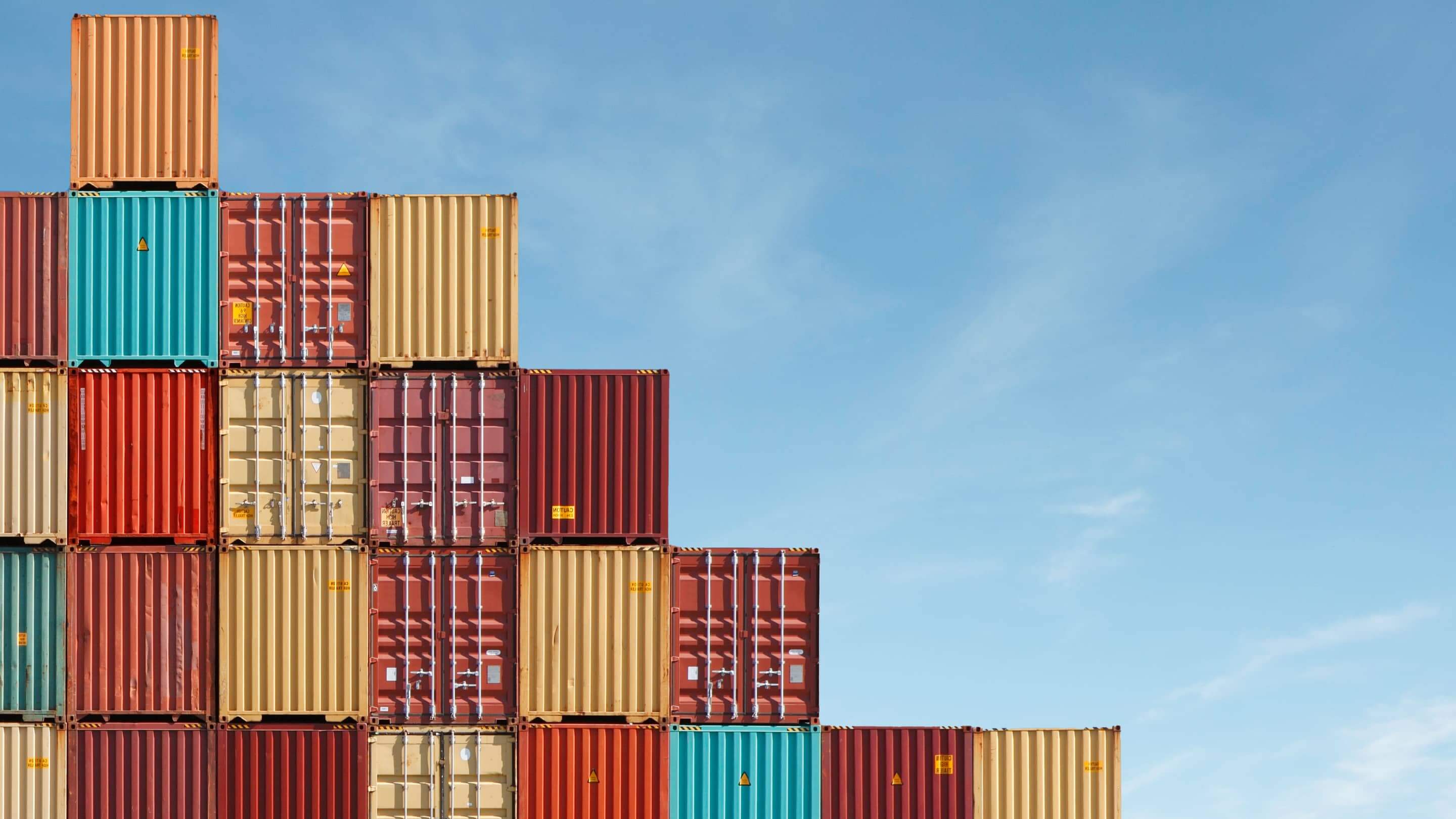 Shipping containers stacked up.