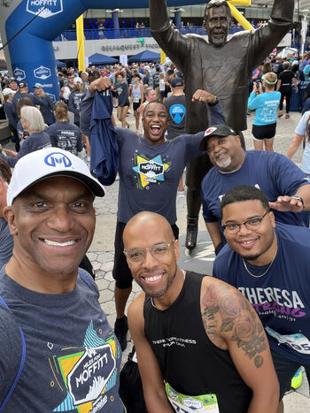 Dr. Lee Green and members of his Miles for Moffitt team finishing the 2023 Miles for Moffitt race.