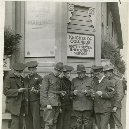 Veterans gather outside of a US employment services building established by the Kinghts.