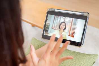 Women connecting and talking on a video call on the phone