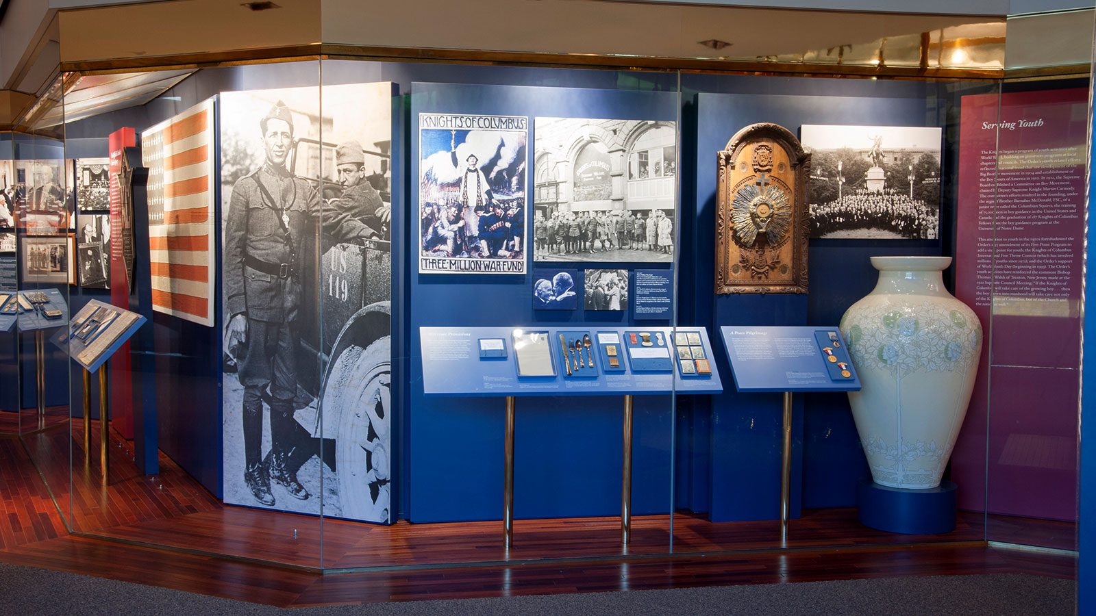 Photo of the Wall of History exhibit where it discusses the Knights of Columbus wartime relief efforts during World War I.