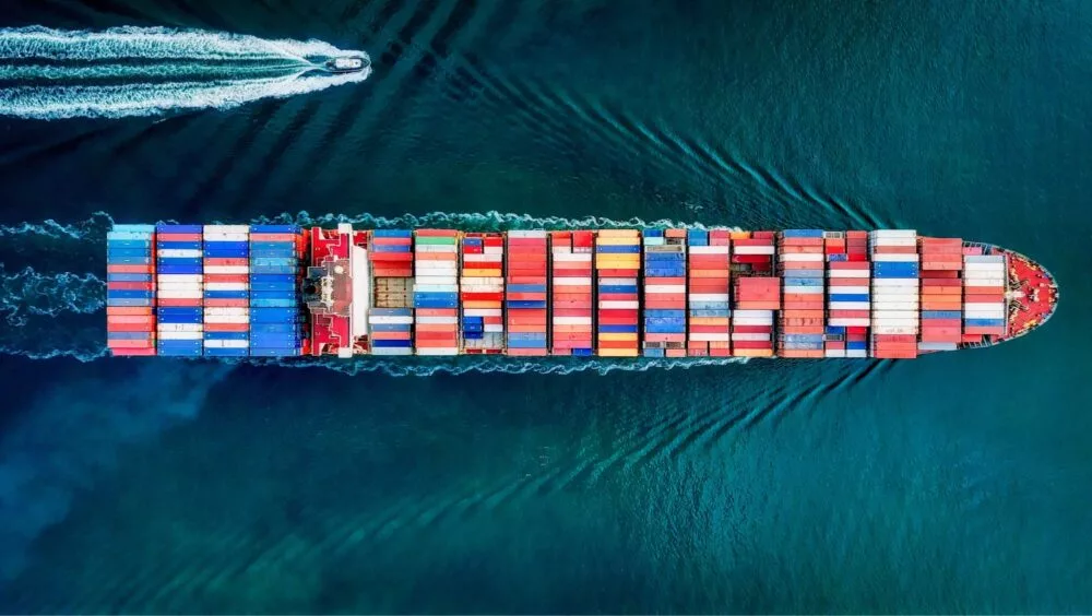 Picture of a cargo ship taken from above for Port Authority of NSW Vocus Customer Story